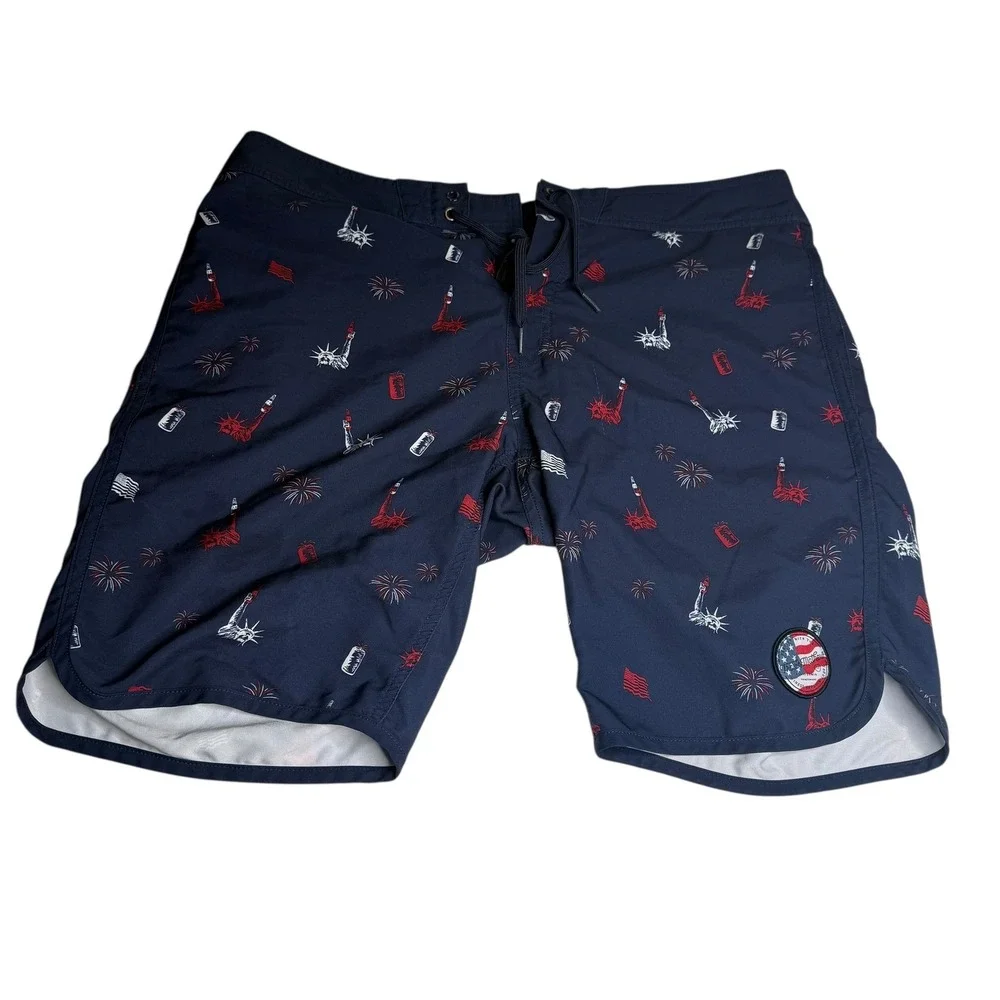 Travis Mathew Mens Swim Trunks Navy Blue Statue of Liberty Fireworks Print Sz 36